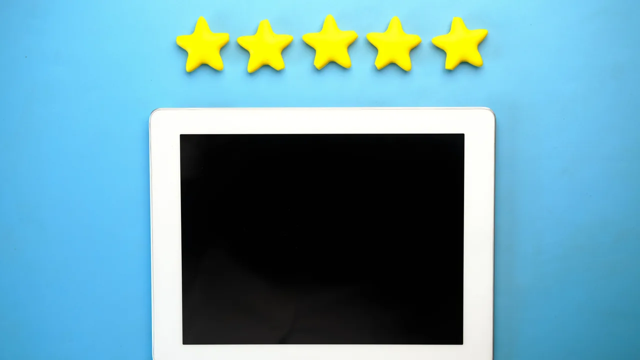 Tablet with customer review stars illustrating online reputation signals
